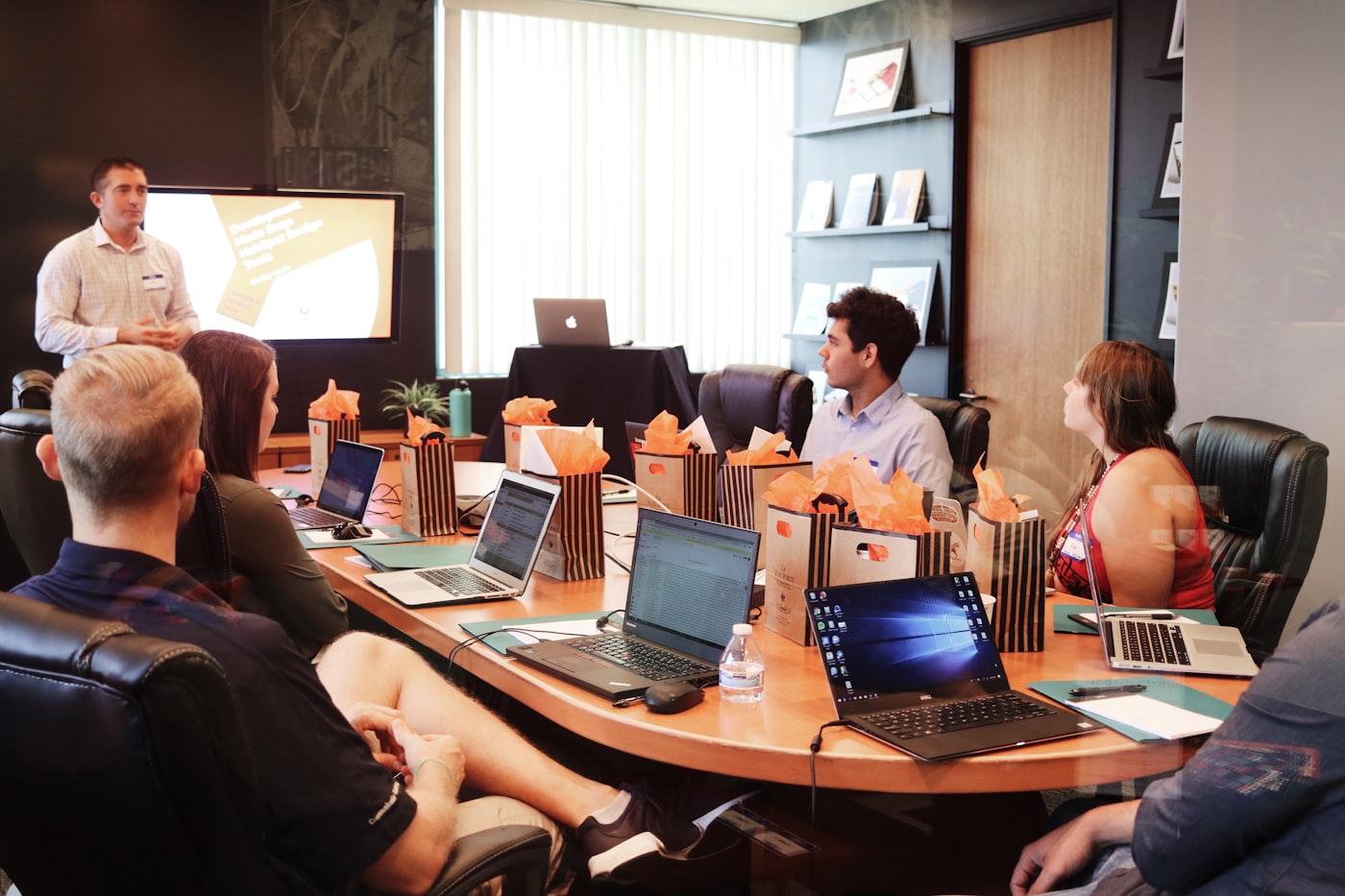 Boardroom meeting; leadership waiting for reports, filtered information